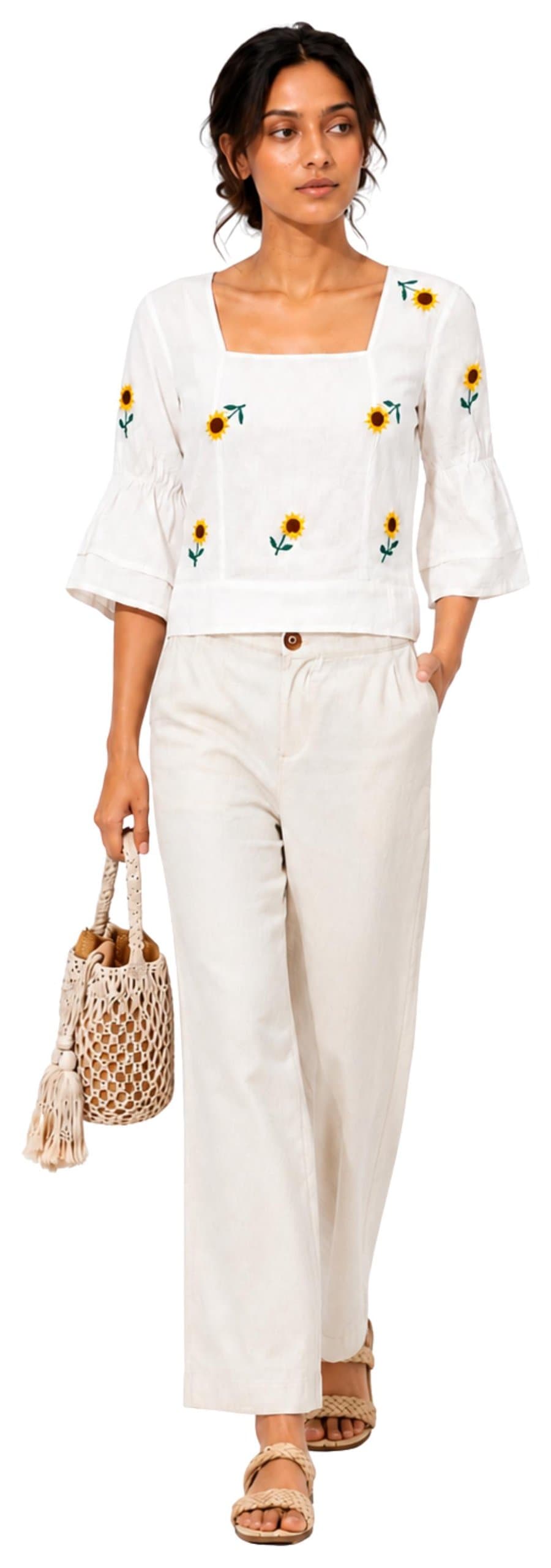 White sunflower embroidered top with wide pants